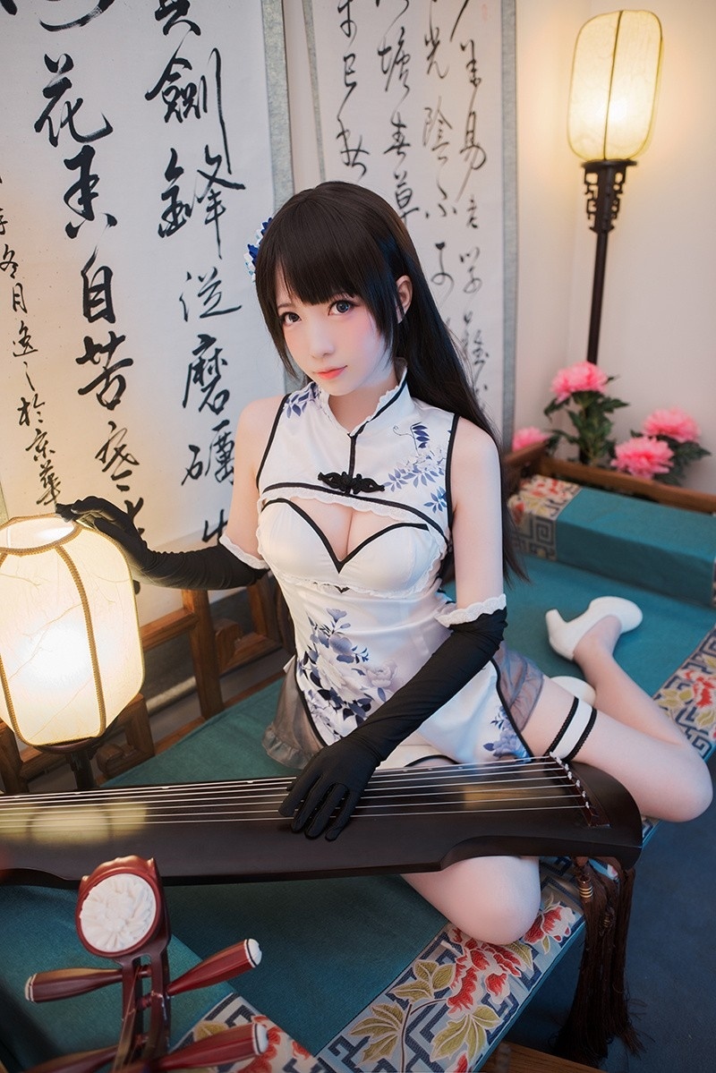书房抚琴美女长腿如白玉酥胸古筝服性感诱惑图片